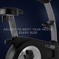 NordicTrack Commercial VU 29 upright exercise bike with gray adjustable seat post and black frame on dark blue background