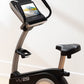 NordicTrack Commercial VU 29 upright exercise bike with black frame, tan handlebar, digital display showing cyclist, and blac