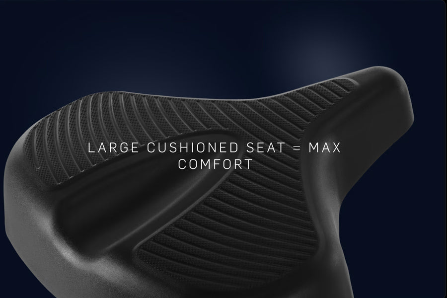Black cushioned bicycle seat with ribbed texture pattern on dark blue background