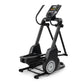 Black NordicTrack FS10i elliptical machine with digital console and moving handles, displayed on white background