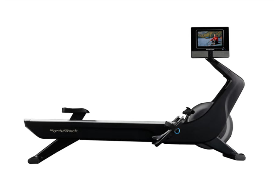 Black NordicTrack RW700 rowing machine with articulating touchscreen display showing workout video, flat lay on white backgro