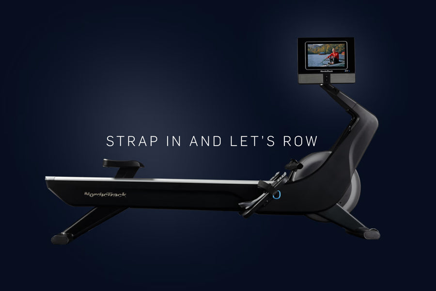NordicTrack RW700 black rowing machine with digital display screen mounted on arm, shown against dark blue background