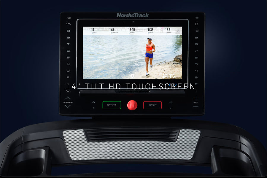 NordicTrack EXP 14i treadmill with 14-inch HD touchscreen displaying runner on beach, black frame with control buttons and re