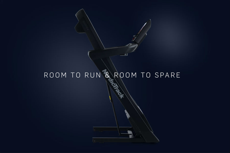 Black NordicTrack EXP 14i treadmill with incline capability on dark blue background