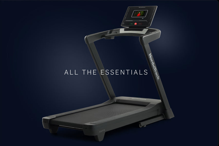 Black and gray NordicTrack EXP 7i treadmill with digital display console on dark blue background