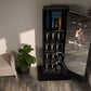 Black home gym mirror with integrated storage displaying fitness app on screen, flanked by potted plant and white furniture o