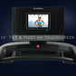 NordicTrack treadmill console with 10-inch HD touchscreen displaying fitness tracking metrics and athlete workout video on da