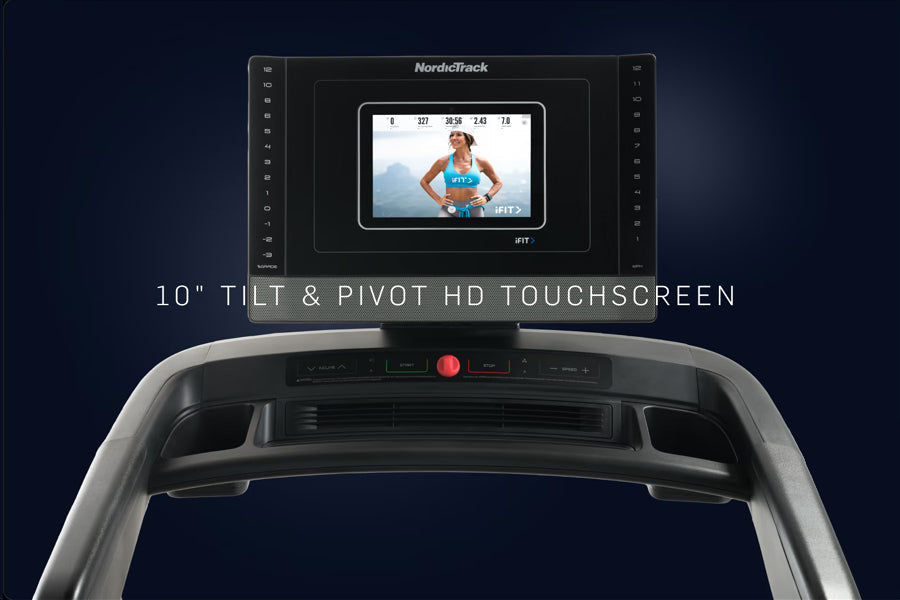 NordicTrack treadmill console with 10-inch HD touchscreen displaying fitness tracking metrics and athlete workout video on da