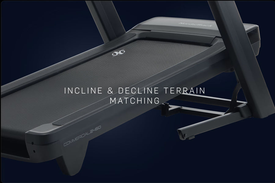 Black commercial treadmill with incline decline terrain matching feature, displayed at angle on dark background