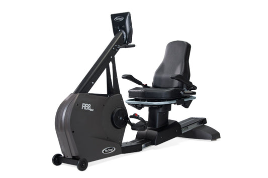 Black recumbent exercise bike with padded seat, digital display console, and foot pedals on white background