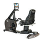 Black and gray NuStep RB8PRO recumbent exercise bike with digital display console, padded seat, and footrest on white backgro