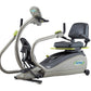 NuStep T4r recumbent elliptical stepper with gray and black frame, padded seat and backrest, foot pedals, and handlebars on w