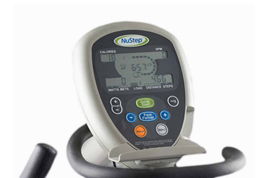 NuStep T4r recumbent elliptical stepper with gray and white frame, digital display showing calories and steps, multicolored c