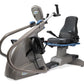 NuStep T5XRW recumbent elliptical stepper with gray frame, blue accents, and black padded seat on white background