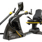 Black and yellow recumbent elliptical stepper with padded seat, handlebar controls, and footrest on white background
