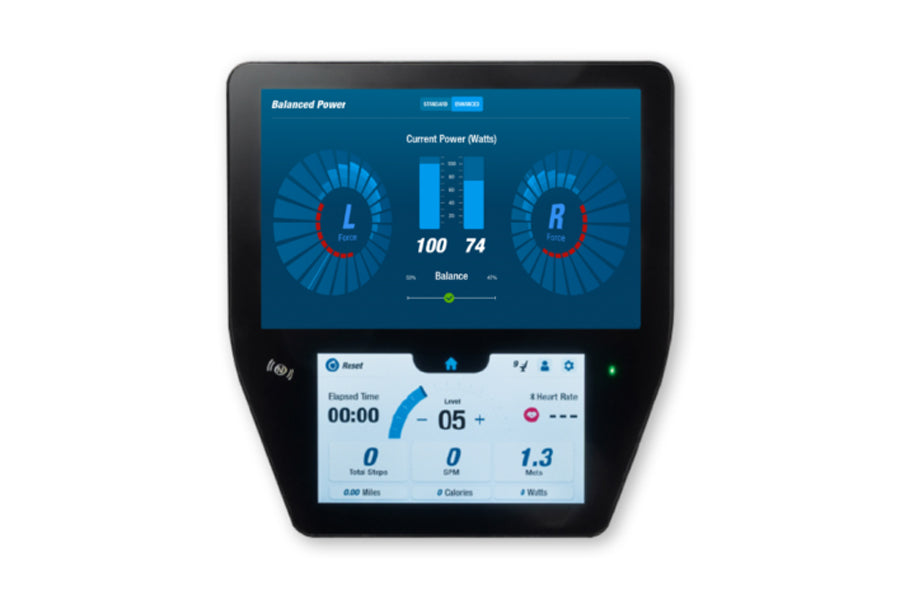 Black upper body ergometer with dual touchscreen displays showing balanced power metrics, current watts at 100/74, elapsed ti