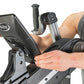 Person using NuStep UE8MAX upper body ergometer with black console and dual handles, shown on white background
