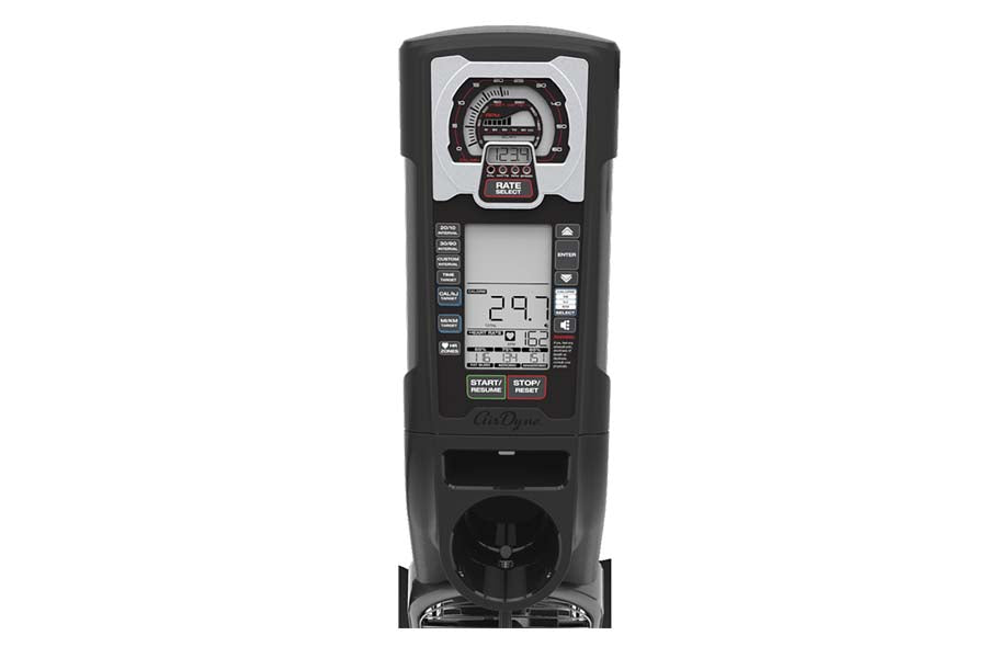 Black Octane Fitness Airdyne exercise bike with digital display showing 29.7, analog gauge, control buttons, and fan-based re