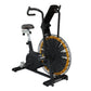 Black and gold Octane Fitness Airdyne X air resistance exercise bike with curved handlebars and padded seat, shown on white b