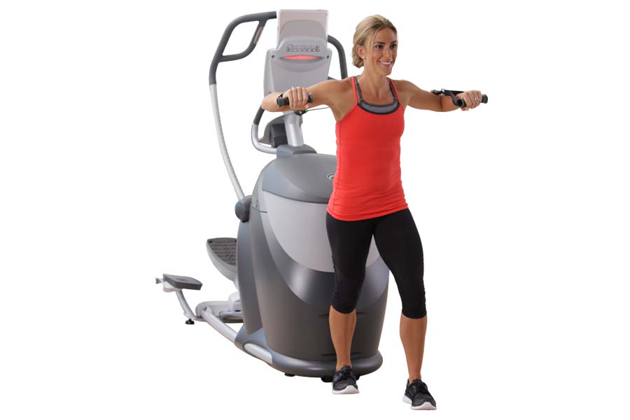 Woman wearing red tank top and black capri leggings exercising on gray and white Octane Q35x elliptical machine