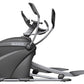 Black and gray Octane Q37x elliptical machine with curved handles and extended footrests on white background