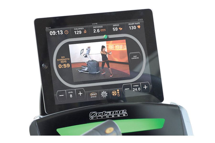 Octane Q37xi home elliptical with touchscreen display showing workout metrics, instructor video, and control buttons on black