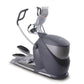 Octane Q47x elliptical machine with gray and black frame, dual handles, foot pedals, and digital display console on white bac