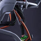 Silver and black Octane Fitness ZR8 Zero Runner with copper frame and green accents, shown with model wearing green sneakers