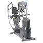 Gray and black recumbent elliptical machine with dual handles, padded seat, and foot pedals on white background