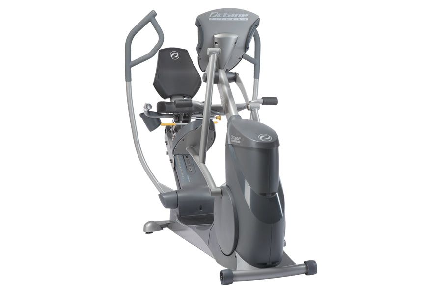 Gray and black recumbent elliptical machine with dual handles, padded seat, and foot pedals on white background