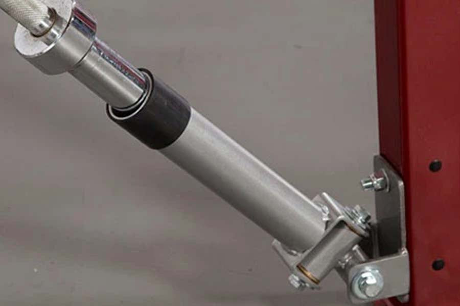 Warrior Olympic Bar Landmine Attachment with silver steel barrel and black grip sleeve mounted on red frame