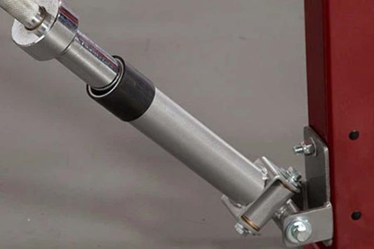 Warrior Olympic Bar Landmine Attachment with silver steel barrel and black grip sleeve mounted on red frame
