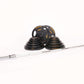 Olympic barbell weight set with black rubber-coated plates and gold text, silver bar, and collars on white background