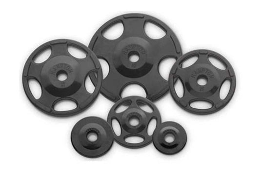 Black rubber grip weight plates in various sizes arranged on white background, featuring handle cutouts and center holes for 