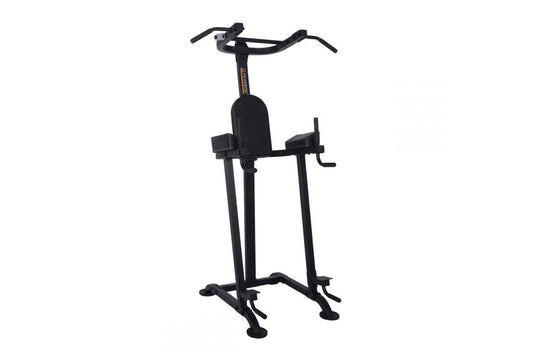 Black vertical power tower with padded seat, drop handles, and leg press footplates on white background