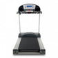 TRUE PS900 treadmill with black running deck, silver frame, and digital console display on white background