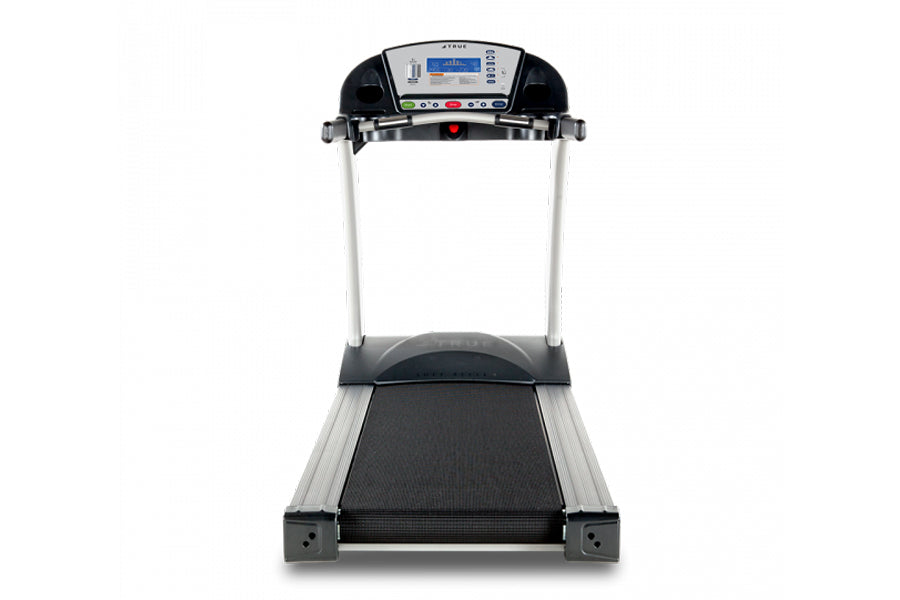TRUE PS900 treadmill with black running deck, silver frame, and digital console display on white background