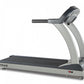 TRUE PS900 treadmill with black running deck, silver frame, and black handlebar on white background