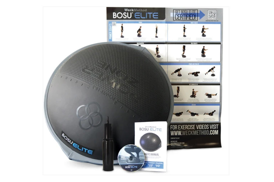 Bosu Elite balance ball in charcoal gray with blue accents, displayed with instruction manual, DVD, pump, and exercise guide 