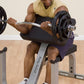 Man in yellow tank top performing bicep curl with barbell on gray preacher curl bench with black weight plates
