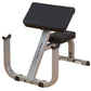 Body-Solid preacher curl bench with gray frame, black padded seat and back support, angled arm rest on white background