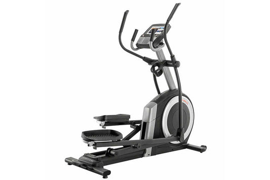 ProForm Carbon E10 elliptical trainer with black pedals, silver frame, digital console, and curved handlebar grips on white b