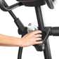 Black elliptical machine with integrated water bottle holder, worn by model on white background