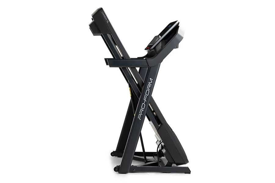 Black ProForm Carbon TL treadmill with folded frame and digital console, front view on white background