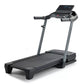 Black and gray motorized treadmill with digital display console, handrails, and cushioned running deck on white background