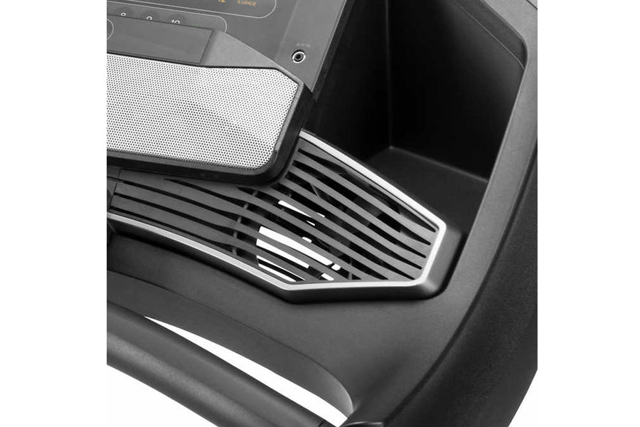 ProForm Trainer 12.0 treadmill console and deck detail showing touchscreen display, metal foot pedal with ribbed texture, and