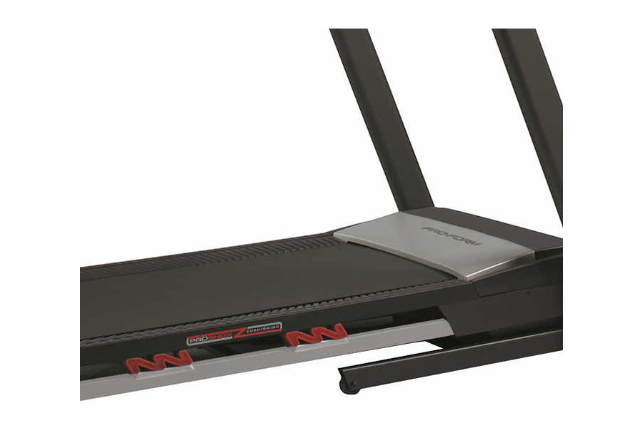 ProForm Trainer 12.0 treadmill with black frame, red accents, dual antenna, and digital console on white background