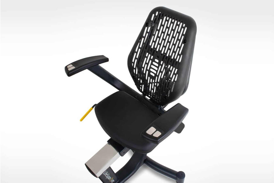Black recumbent exercise bike with perforated backrest, adjustable armrests, and digital console, shown from side angle on wh