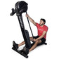 Man in red shirt using black Ropeflex RX2300 rope trainer with dual position design on white background