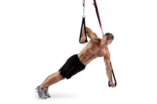 Warrior Rip:60 suspension training straps with man performing angled plank exercise on white background